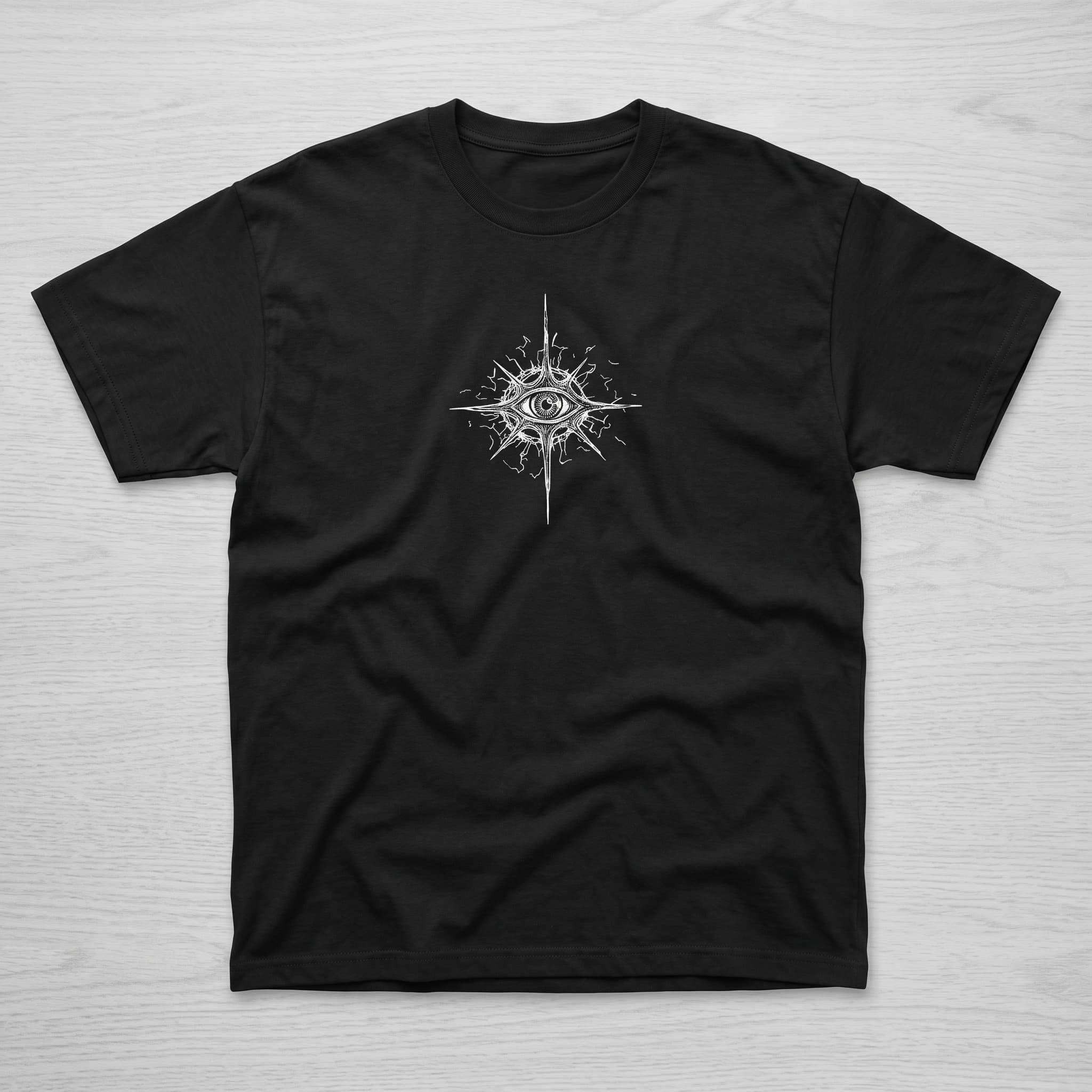 Front of the black Veiled Oracle T-shirt with a white all-seeing eye graphic