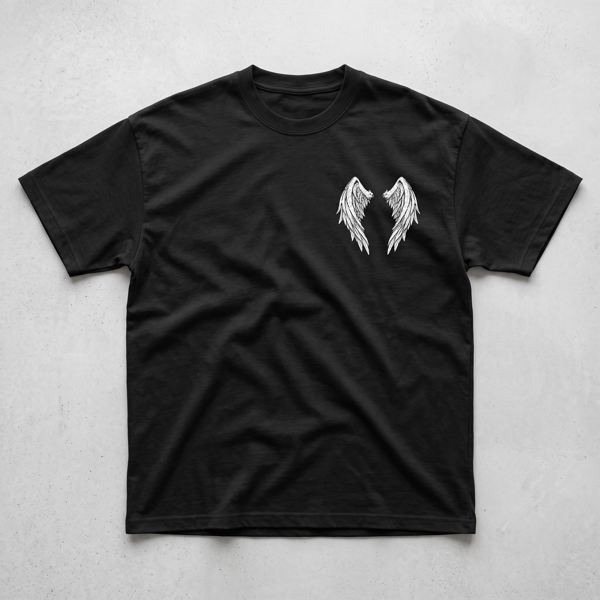 Front of the black Michael Ascendant T-shirt with a pair of white angel wings