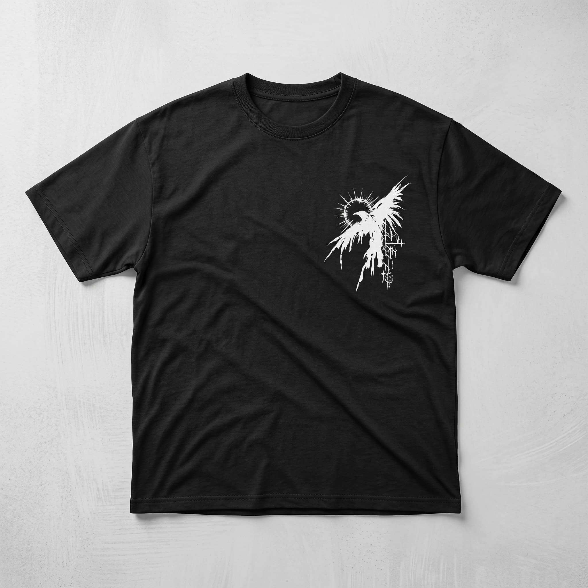 Front of the black Nocturnal Omen T-shirt with a white winged bird chest sigil